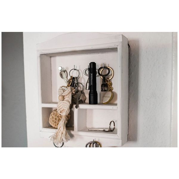 Mini linterna LED alimentada por pilas con clip para sujetarla